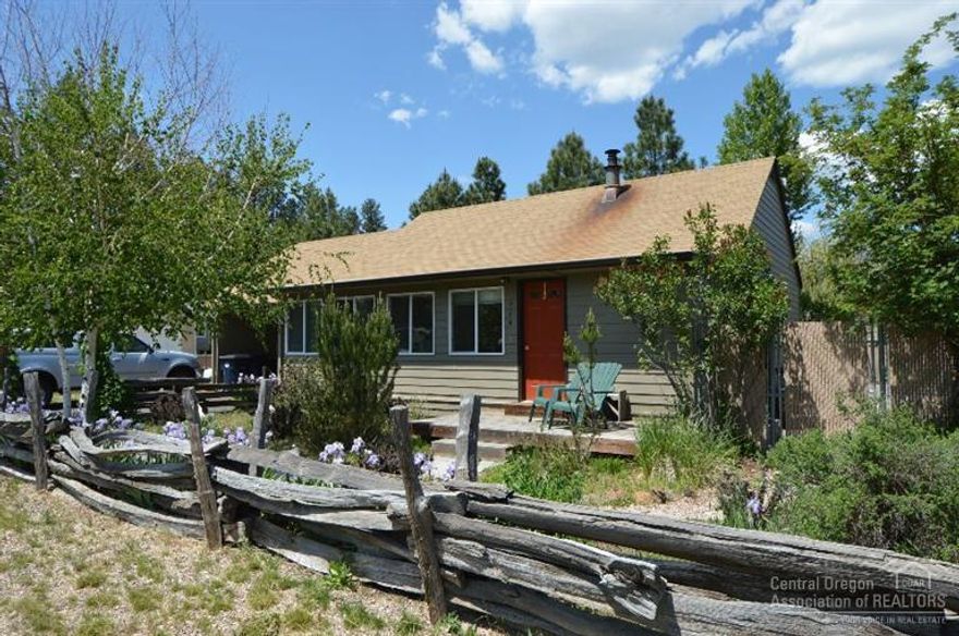 Live, work & play in Town! Sisters's living at it's best with this updated 978 sq.ft. cottage in the heart of Sisters Country. Spacious lot, room to build garage structure and expand living space. Complete with storage shed with work bench and garden/chicken house. Wildflowers flourish with sprinkler system front and rear. Fenced back yard, RV area, six raised beds with drip system & more. Close to trails, creek, parks, shopping, restaurants & Elementary School.