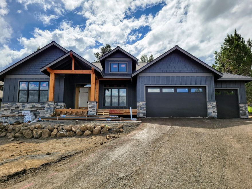 Fabulous Nw Bend home in coveted River's Edge Village golf community. You're going to love this stunning one level Alan Mascord plan. Massive timber framed entry, soaring vaults, hand troweled drywall, Alder Cabinets with solid quartz counters.  Gourmet Kitchen affords the Cafe line GE appliances. Cozy gas log fireplace wrapped in 4' tile and solid black walnut mantle. Low voltage Cat 5 and speaker wiring. Come see this luxurious golf course home uniquely positioned with Easterly City views from the front deck and the tranquility of the 17th fairway from the back patio. Close to miles of walking trails, Sawyer park and the Deschutes River. High efficiency Gas Furnace and A.C. 3 Bedrooms + Den. 759 sf 3 car garage, pre wired for electric vehicle. Keep an eye out for additional photos to be added as finish work is completed you're going to be wowed!