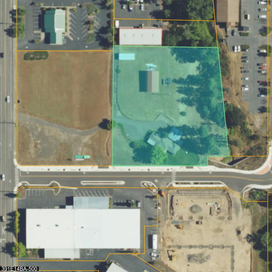 Prime 1.96-Acre Development Opportunity in Ashland! This high-visibilit sitesits within the Transit Triangle  Overlay—allowing for a mix of retail and residential uses. Zoned E-1, the property supports a wide range of commercial and mixed-use development possibilities. Infrastructure and utilities are already in place, including sidewalks, curbs, and stubs to the property via Independent Way, making this site ready for immediate development. The site currently includes a 3 bed / 2 bath 1950s home and a separate barn—both in relatively good condition—which may be utilized, moved, or razed to suit your project needs. Endless possibilities: retail strip center, multi-family with office/retail below, QSR pads, boutique lodging, and more. A rare opportunity to develop in one of Ashland's most accessible and commercially zoned areas—don't miss it!