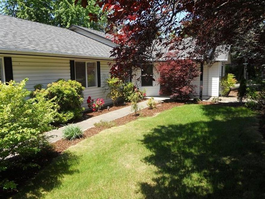 Partially secluded home in great area! Nice 4 bedroom/2 bath home on large lot .43 of an acre with lots of room for entertaining and play area. Nice landscaping with easy care. Has RV parking, basketball hoop and lots of room for additional parking for multiple cars. Double over sized attached garage with big area for a shop. This is a great family home in the Central Point area. Large pantry area, formal dining, and large utility room. Hot Tub off Master Suite.