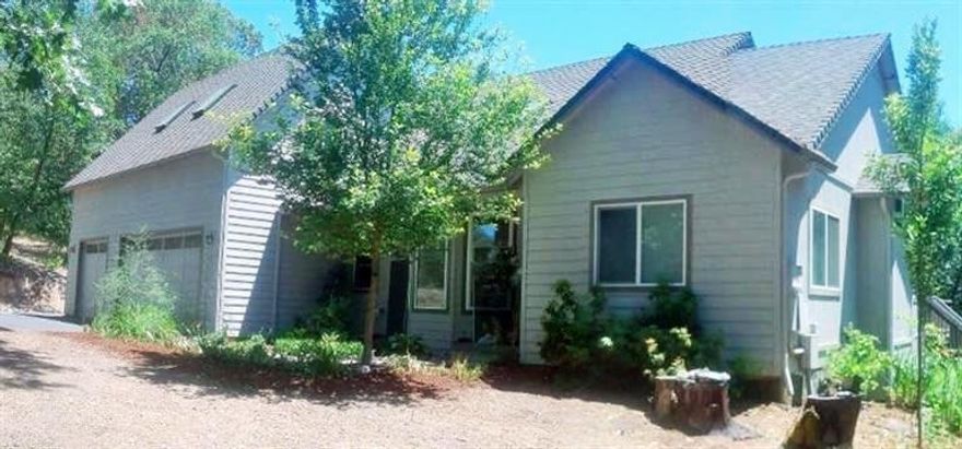 Built in 2002 with all the beautiful amenities. 2643 sq. ft. 4 BRs and 3 BRs on 2.72 acres. Every thing is on the main level except a huge finished room above the three car garage with its own bath. The Master is large with a very large bath and walk in closet. Beautiful hardwood floors and a real fireplace too. Enjoy a beautiful Kitchen and a three car garage. This property has been discounted $75,000 because it has a low producing well. In the summer time if the new owner wants to use water to water outside they might have to top off the 2000 holding tank. 3000 gallons of water delivered is $180 per Mikes Water Truck Service. The current well is 1/2 gal per minute. Approximately annual water cost is about 720. or $60 per month. Owner lived there 11 years with no problems.