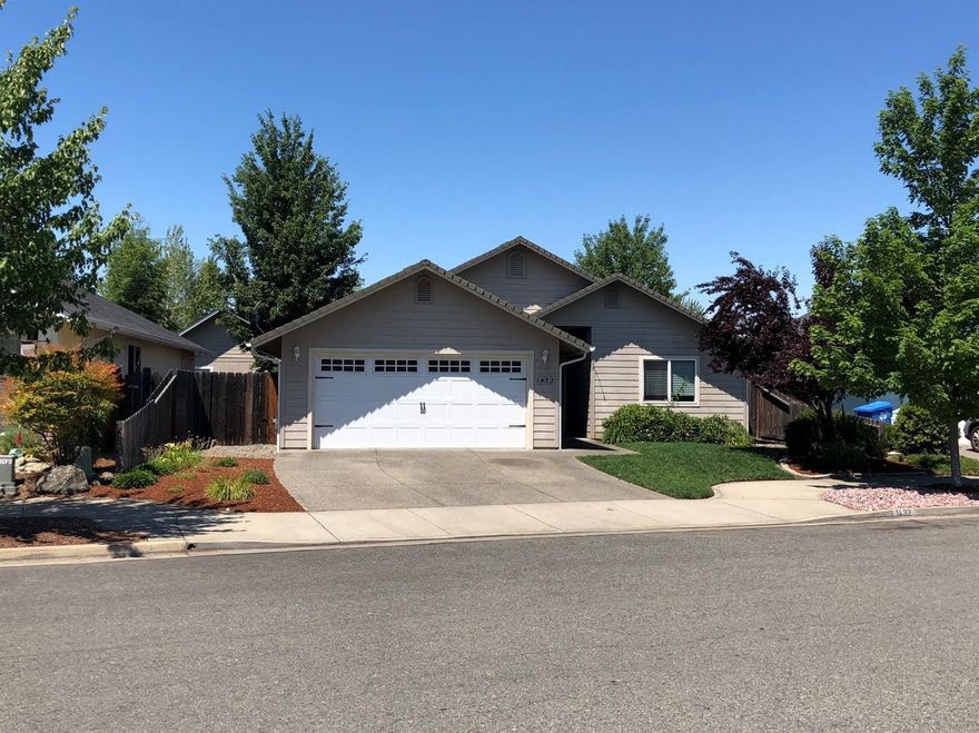 This 2004 Kirk Chapman built home has 1502 square feet with 3 bedrooms, 2 baths, and an office/den. Looking good with new carpet some new vinyl, a semi-open floor plan, and vaulted ceilings. Exterior door leads from master bedroom to the patio. The .12 acres is in an excellent location on George Tweed, so close to shopping, medical facilities and Rogue Community College. There is a finished double car garage, interior laundry room and extra cabinets and an easy maintenance yard. It is all ready to move into! Owner will consider any reasonable offer!