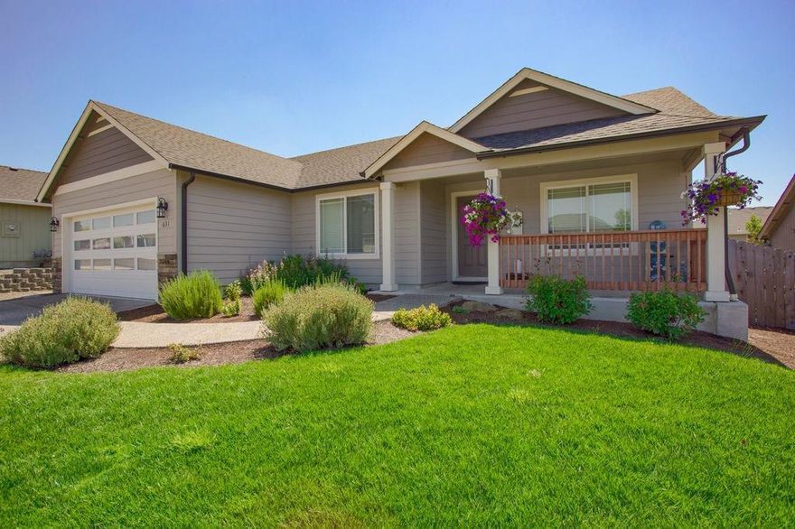 Welcome home! Inviting front porch with exposed aggregate driveway and porch. 2013 built 4 bed 2 bath 1700 sqft in the Barton Hills Subdivision. Great floor plan. Front room has a double door and could be perfect as an office. Soaring vaulted ceiling in living room and master suite with accent planter shelves. Laminate floors throughout the main living spaces & front room, newer carpet in bedrooms. Kitchen features newer bitten edge granite, tile backsplash, under cabinet lighting, stainless steel appliances & eat-in bar. Over-sized master suite with walk-in closet, dual vanity & tile floors in master bath. Large .18 acre lot with nice-sized backyard, raised garden beds, additional hot tub patio with circuit, and garden shed. Plenty of storage.