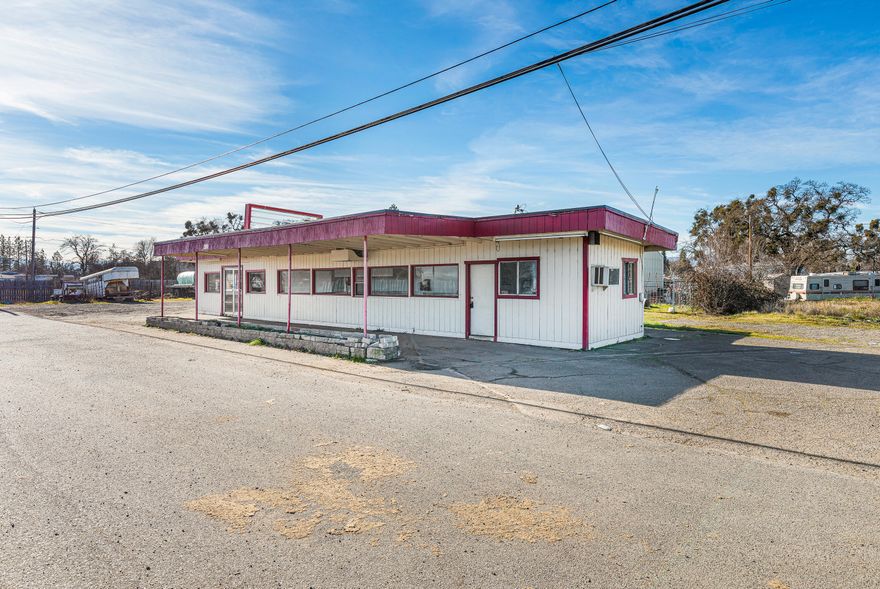 Commercial building in great location with high traffic exposure! Previously Taco Delight, this commercial space sits on just over a half acre lot on Table Rock Road and includes a drive through and plenty of parking! This building is perfect for any type of restaurant or food business with a large kitchen area, two bathrooms and plenty of room for indoor seating. Don't miss the opportunity to start your new business venture today, call to schedule a showing!