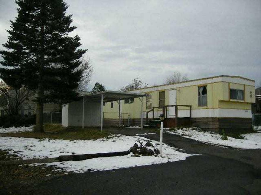 Decent Older Mobile. Needs A Little Tlc - Will Make Someone A Nice Home. Has Some Cute Features. Fenced Backyard And Separate Fenced Dog Run. Storage Bldg Attached To Carport. Nice Yard.** Go In Through Back Door To Show. Lock When Leave. Thank You.