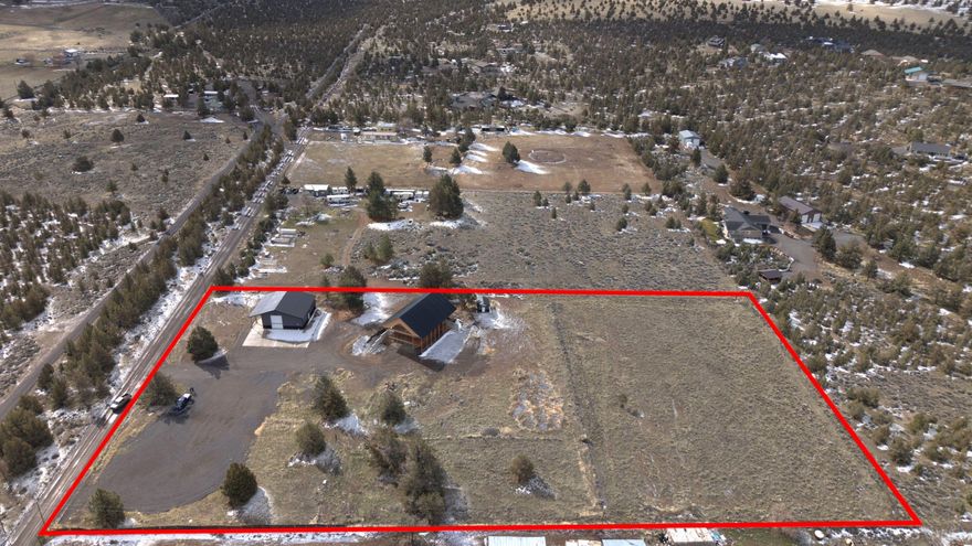 Situated on almost 5 acres with breathtaking elevated Cascade Mountain views, this property features a large finished pole barn with roll-up door and an unfinished built-in apartment, offering excellent storage, workspace, or potential temporary living quarters. Additionally, a partially built home sits ready for completion, with a solid foundation, framed walls, and a completed roof—providing an incredible opportunity for a new owner to bring their vision to life. With ample space, privacy, and endless
potential, this property is the perfect canvas for your dream home.