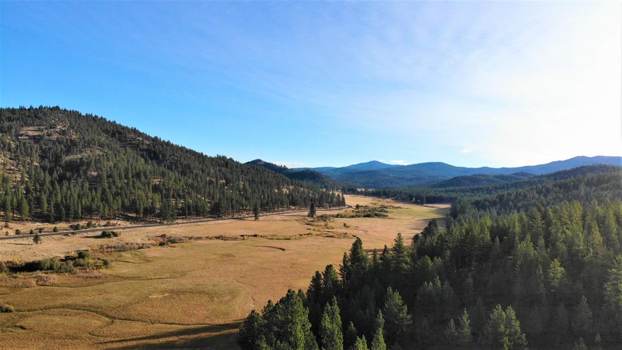 Gateway to the Ochocos... Here lies an amazing 406 acre ranch with Ochoco Creek frontage, just 15 miles east of Prineville and at the base of Ochoco National Forest. This peaceful, rare offering could be your new home, hideaway or family retreat. This Ochoco Creek mountain ranch is over 400 acres of creek bottom, irrigated meadow and timbered mountain side. With 82.2± acres of water rights from Ochoco Creek, LOP tags, a nice 2 bedroom/1 bathroom farmhouse and a shop with guest quarters, including a full bathroom in the shop. This ranch has all the features you could want... big game hunting, fishing, grazing, privacy and lots and lots of beauty!! All conveniently located just 15 miles from town. Per Crook County, the existing 1959 dwelling can be replaced and it might be possible to break off a piece for another dwelling (the minimum lot size is 80 acres for a new parcel).