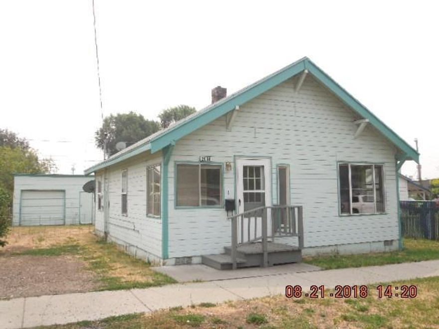 Cute little home near down town. Featuring 2 bedrooms,1 updated bathroom with newer vanity, vinyl floors & tub with tile shower surround. Small sun porch, large living room with fuel oil monitor heat, large kitchen with dining area, and laundry/mud room off the back of the house. The master bedroom has a large walk-in closet + additional closet space. Fully fenced yard, detached garage with workshop area, and nice deck for entertaining or BBQs. This house would make a great investment property or first time home.