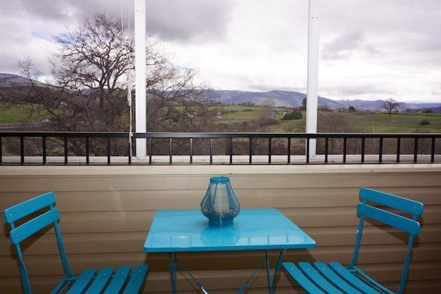 Two screened-in balconies! One faces east for morning sun and great views of the Cascades. It is located for easy access from the living room and the kitchen - great for enjoying the morning beverage and newspaper. The second balcony, accessed from the owner's suite, faces south for year around sun and views of the Siskiyou mountains and City of Ashland. Two bedrooms plus additional bonus room/den/third bedroom possibility. Two walk-in closets. Custom window coverings throughout. Two built-in butler pantries for excellent storage. Breakfast nook in a large, sunny kitchen. Formal entry opens into the great room feel living room and dining room with the tremendous views. Large laundry room. Assigned garage parking and storage. This is an end unit with lots of windows and light. This is a special opportunity.