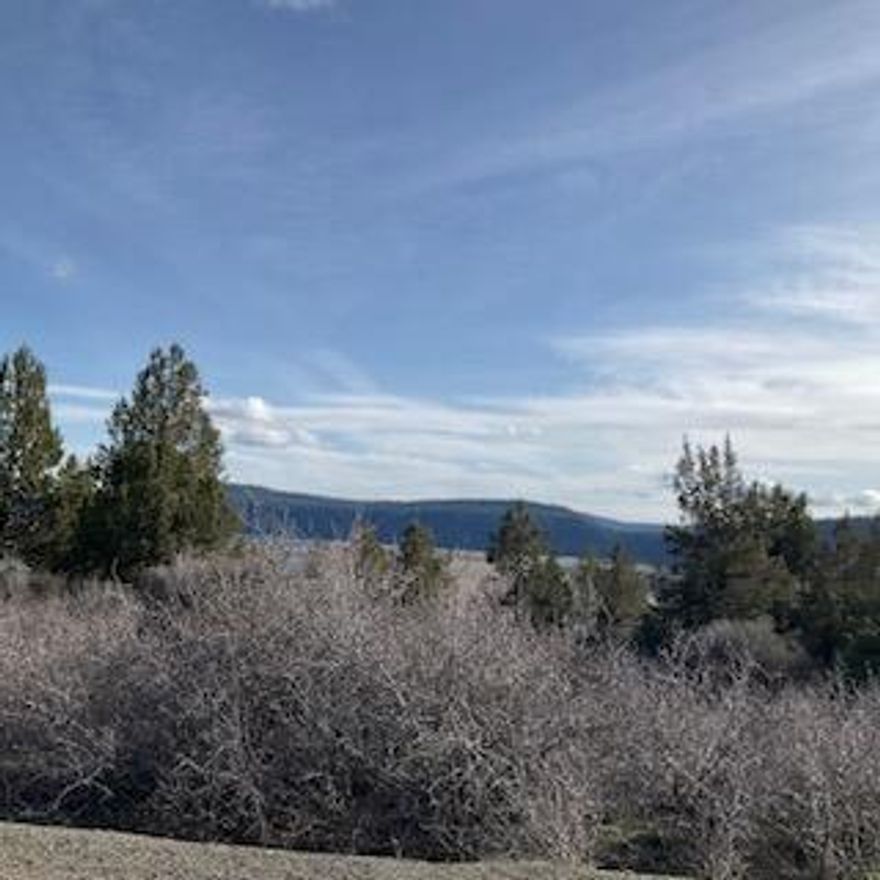 Almost an acre at the Running Y Resort, with panoramic views of the Cascades plus the changing colors of ranch lands. Located in the West Ridge neighborhood of the Running Y, this area receives afternoon sun and boasts glorious sunsets.  Topo and Tree survey provided with sale.  Buy now and build later.  What a buy!!