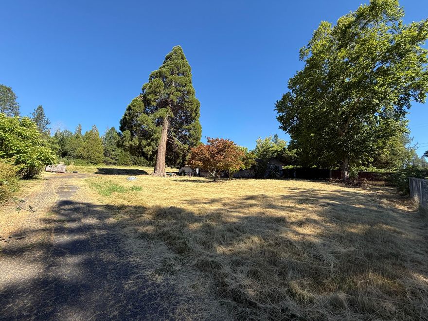 Bring your visions and a tool belt! With 2,092 square feet, this 4-bedroom 2 bath home sitting on 1.13 acres is ready to be returned to all its glory. The overside double car garage offers ample space to store your tools for this home renovation. Property to be sold in As-Is condition. **Multiple Offers received, Highest & Best due by Monday 7/14/25 @ 7:00PM**