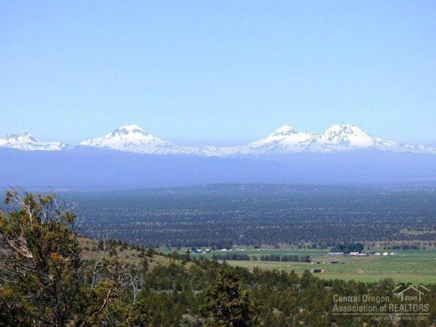 Absolutely Stunning Views! This is a hard to find property that borders BLM land with fantastic Cascade Mountain Views. Build your dream home on 19.88 acres with lots of privacy in a great setting that sits up high in Powell Butte. Nice views of Smith Rock, green pastures below and great rock outcroppings. Amenities include 1/2 shared well, private gravel driveway, conditional use permit, septic approved. Great chance to reduce your carbon footprint and move toward a more sustainable solar energy source.