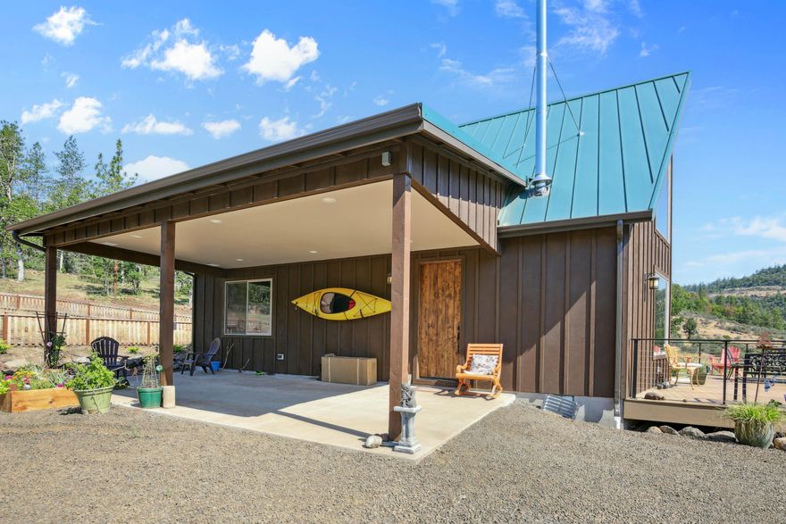 Escape to the perfect blend of modern comfort and rustic charm in this stunning 2024-built A-frame home, nestled on 4.69 private acres—3 of which are fully fenced. Featuring 1,501 square feet of thoughtfully designed living space, this custom-built gem showcases beautiful woodwork throughout, oak floors, and a warm mix of hardwood, carpet, and tile for a cozy yet stylish interior. The large, open-concept kitchen is fully equipped with butcher block countertops, stainless steel appliances, and ample room for entertaining. Comfort is a priority with ductless heating and cooling units, a woodstove for added ambiance, and a 2000-gallon holding tank plus a whole-home generator for peace of mind and self-sufficiency. With two spacious bedrooms—each with its own bath—the upstairs suite offers added charm with a private balcony. Landscaping is currently underway, adding the finishing touches to this serene retreat. Don't miss your chance to own this unique property!