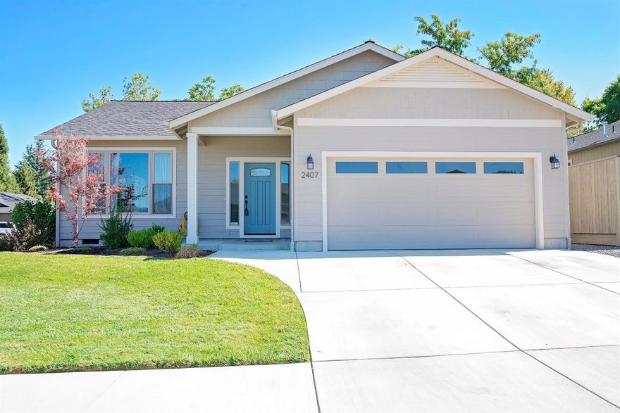 Just like new home in a fantastic SW Medford location! Very desirable neighborhood in the Griffin Creek School area. Home was built in 2013 and is located on a 0.14 acre corner lot on a quiet street with all newer built homes. This 1563 sq ft, 3 beds, 2 full baths house features vaulted ceilings, granite counter tops, white cabinets, large master suite w/walk-in closet, 2 car garage and much more. It also includes beautiful hardwood floors in the kitchen and dining area, and tile floors in the bathrooms and laundry room. There is a nice covered patio area out back and well maintained landscaping all around. This home won't be on the market long, come tour it today. Seller is a licensed Real Estate Broker in the State of Oregon.