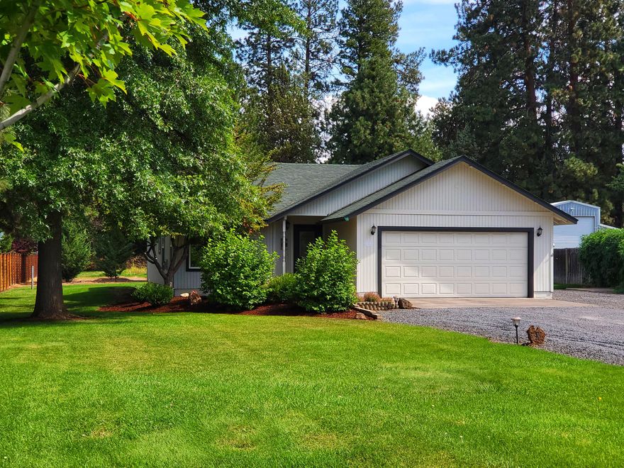 Live the Bend, Oregon dream from this perfectly located cutie! Private and peaceful .62 acres near the Old Mill and above Riverbend Park! Head out the back door to the canal trail and wander to the Deschutes River Trail with easy access to concerts, coffee shops, eateries and more. The darling 2 bedroom 2 bathroom home was lovingly updated in 2017 with new windows, solid core doors, new trim, flooring, interior and exterior paint and a new furnace and AC unit. The beautiful kitchen with center island, stainless steel appliances and lots of natural light is a dream for any chef. Cozy up by the gas fireplace or have a soak in the  hot tub as you watch wildlife play near the pond in your private oasis! Whether you seek privacy or want a place to garden, this big lot with irrigation and a pond is a rare find in the heart of Bend. There is a 2 car attached garage and plenty of room for RV and toys. Potential to expand home / add ADU.