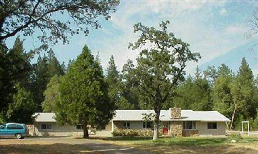 Spacious Country Home On 1.5 Level Acres In The Evans Valley. 4bd/2ba With Family Room (Could Be 5th Bedroom), 3300+ Sqft Per Owner. Amenities Include New Laminate Flooring, Newer Septic & Leach Field Per Owner, Heat Pump, 37'x50 Shop/Garage/Carports.