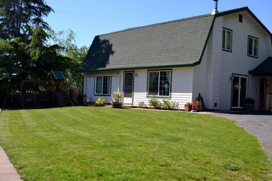 Great little home in desirable NE part of town. Very close to shopping, excellent schools, and the home has been lovingly and tastefully updated with new heat, doors, trim and so much more. Sits at the end of a quiet street and on a flag lot. Lots of room to spread out and a garden too. Great value for the price and features.