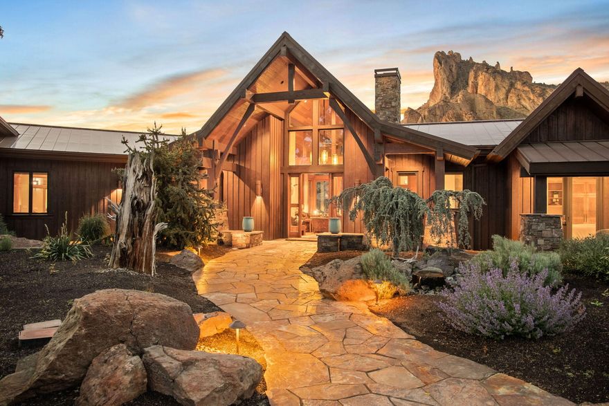 Step into a story book and create your own fairytale. A luxurious retreat nestled in the scenic beauty of Terrebonne, Oregon. This stunning property offers the epitome of refined living, where every detail has been meticulously crafted to create an unparalleled experience.
Perched on a sprawling estate, this architectural masterpiece boasts breathtaking views of the iconic Smith Rock, the Crooked River and the surrounding natural wonders. Immerse yourself in the serenity of the landscape as you unwind in the privacy of your own oasis.
Step inside and be greeted by an abundance of natural light that dances across the grand foyer, highlighting the elegant craftsmanship and exquisite finishes throughout the home. The open-concept design seamlessly blends the spacious living areas, perfect for both relaxation and entertaining on a grand scale. Home being sold Turn Key. Furniture included.  Seller will offer a $20K credit to buyer for accepted offer closing prior to 8/18/23.