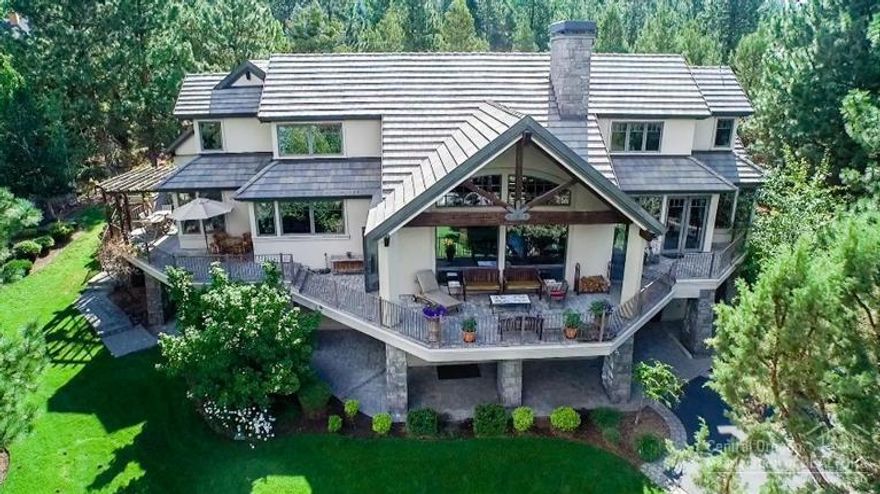 A thoughtfully scaled main level living space, including master suite, great room with fireplace, entertainer's kitchen and both a formal dining room and casual breakfast nook. Separate upstairs, 2 spacious en-suites. Second great room and 4th bed in lower level. Unobstructed Cascade views from every living space while mature landscaping provides privacy. An unparalleled home in design, craftsmanship, & location for the most discerning buyer. 4 car garage. Covered terraces w. fountain.