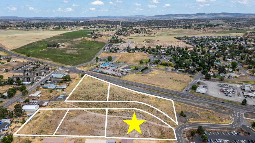 Rare opportunity! This 1.40 acre commercial parcel is zoned C-1 and offers prime development potential in a highly visible location in Madras, Oregon, just off Highway 97. Permitted uses include retail, restaurants, offices, and public facilities, providing flexibility for a wide range of projects. With it's versatile zoning and Central Oregon's continued growth, this parcel presents outstanding potential for investors and developers.
