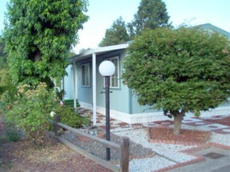 Delightfull home in Glenwood Mobile Estate a 55 and older community. Home has vaulted ceilings, large living room with arched opening to den or study. Nice kitchen with natural wood cabinets with area for table. Step-in shower in master bathroom. Large covered patio to view the many raised garden beds. Home is located so there are no homes back of you making it private and peaceful. Glenwood has a nice community center with kitchen, laundry. library, new exercise room and pool table. Close to medical clinics and public transportation and greenway bike path.