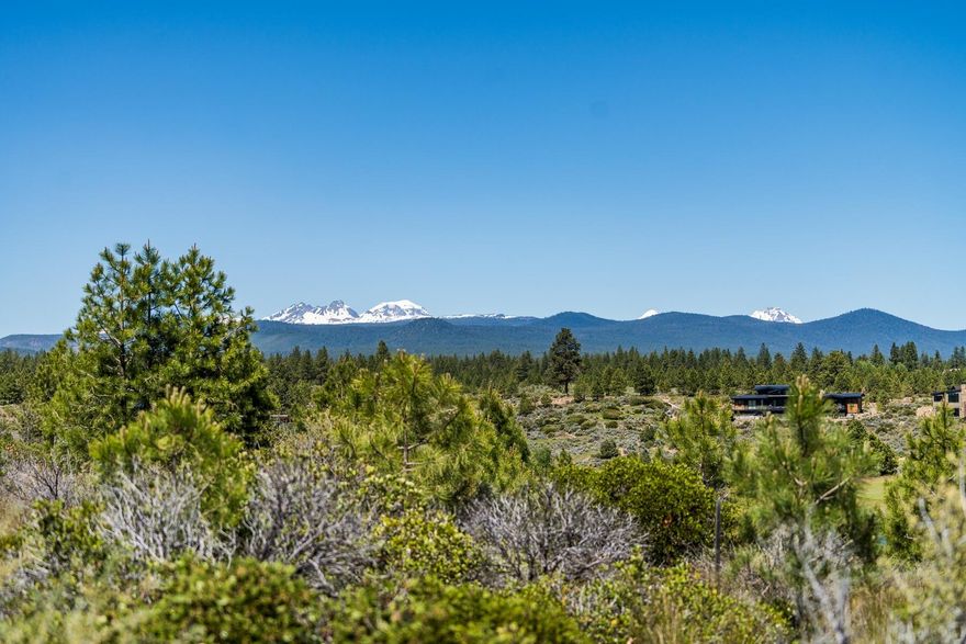 Imagine creating your dream home on one of the most desired homesites in Tetherow. This special piece of land is perched above the 2nd and 7th holes, offering breathtaking, unobstructed Cascade Mountain views and overlooking the famed Kidd's Corner. With its coveted private location, you'll enjoy access to world-class amenities while embracing the tranquility of this award-winning community. Plus, you'll be just minutes away from downtown Bend, mountain biking on Phil's Trails, or a powder morning at Mt. Bachelor. Walk this spectacular lot in person to fully experience its grandeur and beauty. Surrounded by unique 270-degree views and remarkable topography, your dream home is waiting to be built! A full set of house plans by the esteemed Portland architecture firm Giulietti Schouten Weber Architects is available with the sale of the lot. Buyer is responsible for Golf or Social Membership.