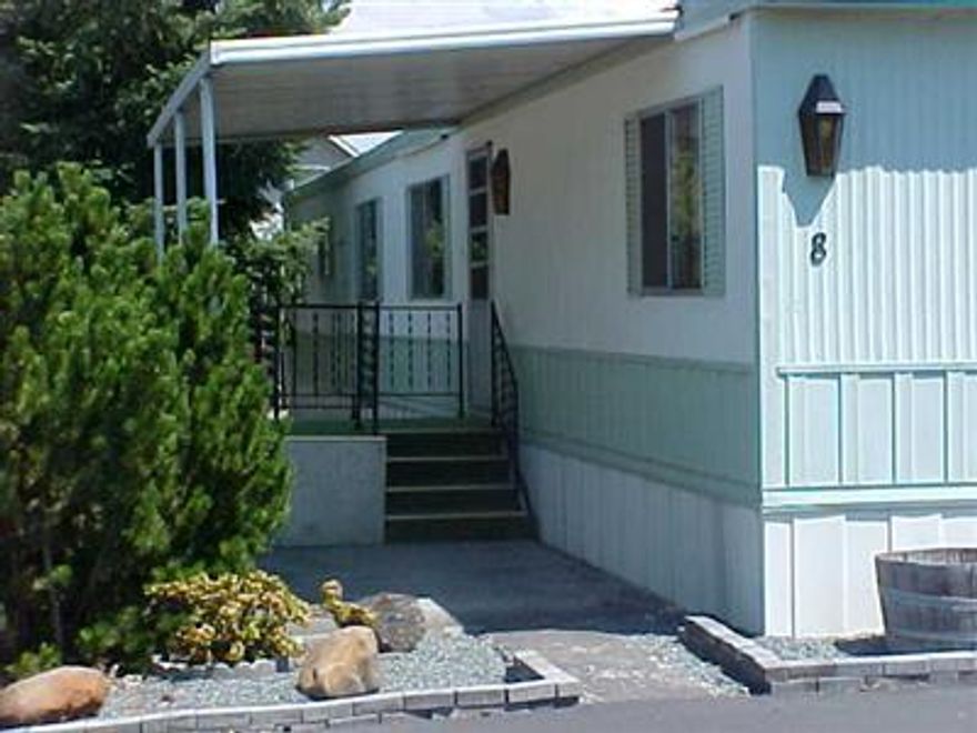 Very well maintained,neat as a pin, 924 sq ft manufactured home in a 55+ park in Talent. 2 Beds/1 bath & bigger inside than it looks. New laminate floor in the kithen & dining room as well as low maintenance landscaping & garden. All of this in a quiet park (Candlewood). See it right away before it's gone at a low,low price. 1 Year American Home Shield Warranty.