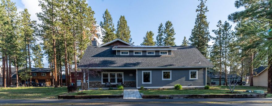 Beautiful, one of a kind Craftsman home w/ADU in a superb location! Main house has a beautiful foyer, bright living room w/fireplace, high end flooring, spacious modern kitchen, pantry & stainless steel appliances. Access from kitchen & primary to private patio-hot tub ready. Owner suite vaulted ceilings on main w/ 1/2 bath & laundry room. 3 car extended length garage w/double & single door, w/ a separate ADU entrance & parking. ADU is a one bedroom apt. Walkable to restaurants, schools & shops!