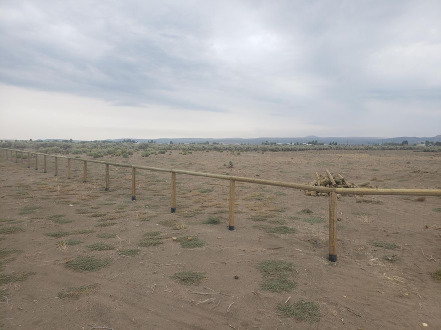 Nice level 20 acre parcel, fully fenced with a gate by the road. Front half of lot has been cleared of brush and is ready and waiting for your new home! or other improvements. Power is about 3 poles a way.  Buyer's responsibility to do all due diligence regarding use, building, etc. Owner terms Available with large down. 
Directions: Traveling East on Christmas Valley Hwy turn left on Candy Ln, than right on Autumn to sign on right. Coordinates 43.24355  -120.71407