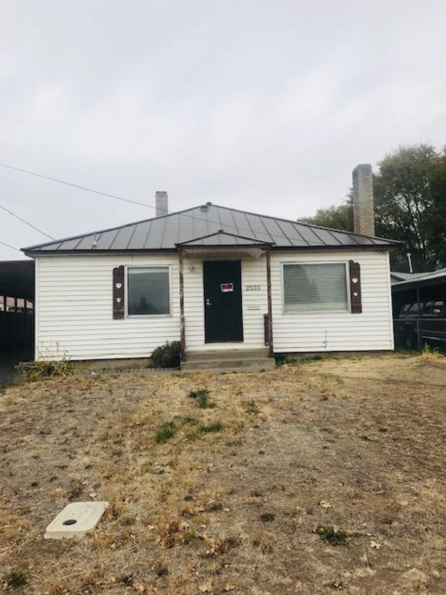 Perfect investment property. Newer furnace, updated thermostat, gas stove, metal roof, carport with a one car garage. Home needs some TLC