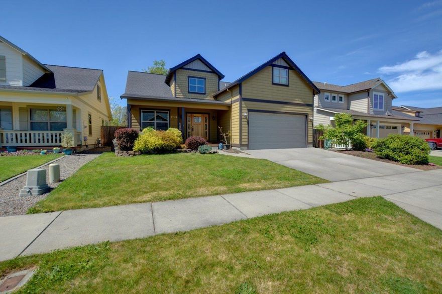 Two-Story 4 bedroom craftsman located in desirable Southwest Medford close to South Medford High School. Living room features tall vaulted ceilings with gas fireplace and an abundance of natural light. Kitchen has stone countertops with gas stove. Separate area could be used as formal dining room or office. Master is on main floor with vaulted ceilings, walk in closet, and larger master bath. Upstairs are three additional bedrooms and open space that has views to downstairs living area. Back yard has covered patio, in ground sprinklers, fire pit, garden shed, and a separate garden area.