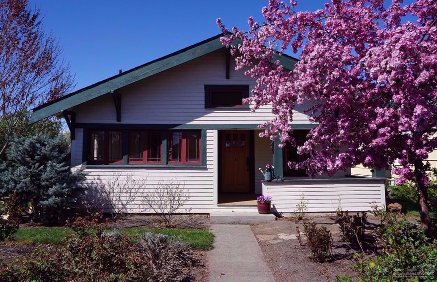 Classic 1920's Craftsman bungalow just a few blocks from historic downtown Redmond. Beautifully renovated to retain its charm, yet tastefully updated. The old wood floors have been restored, while the kitchen comes with stainless appliances, solid surface counters and a country sink. Leaded glass, double-hung windows, and a delightful sunroom with French doors inside. Outside, enjoy the patio and garden.Fully fenced with sprinklers and drip system. Even a vintage garage used for a car or shop.