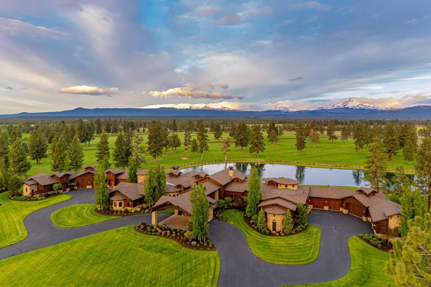 Transcend luxury to embody extraordinary at R&R Ranch, a distinguished equestrian estate built for generational heritage. Set on 190 acres with sweeping Cascade Mountain views, this legacy property offers rare privacy and an uncompromising standard of living. The 14,666 sq ft main residence showcases artisan craftsmanship with hand-hewn beams, refined finishes, display kitchen, culinary kitchen, 600+ bottle wine cellar, and custom theater with balcony seating. Along with the primary wing, a well-appointed office and two guest suites are located in the main home, complemented by two fully-equipped cabins with private living areas, kitchens, and garages. Designed for equestrian and recreational pursuits, the estate features an indoor arena with viewing gallery, racetrack, round pen, fully stocked recreational pond, 12-stall barn with locker rooms, staff lounge and saloon, rec barn, and 9-bay shop. With 120+ acres of deeded water rights, R&R Ranch is where natural beauty and legacy meet.