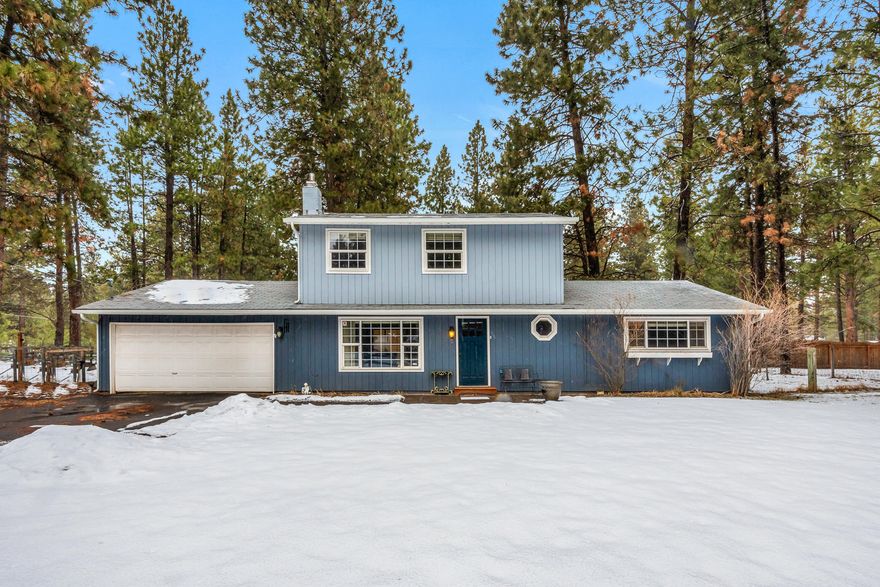 Live the dream on the Hobby Farm property in Deschutes River Woods. Nearly an acre of fenced land with room to roam, fenced and cross-fenced for pets, gardening or enjoying simple solitude. The four bedroom, two-bath house has upgraded kitchen and bathrooms, newer flooring in the main living area, and open lower level with sliding glass door that opens to a beautiful custom deck. In the warmer months the rolling lawn is surrounded by paver stones. Two-car garage with ample driveway parking Roads are paved until the short portion of Indian Summer Drive. Corner lot with lots of privacy. Large shed serves as a small area for animals or storage.