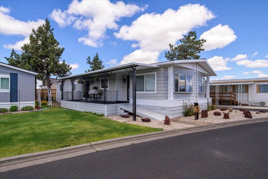 Many updates to this beautiful two-bedroom, two bath, 1,550 sq ft. home which was manufactured in 1977. The space rent is Co-op controlled at only $385 per month. The large master bedroom and bathroom suite has a built-in vanity, granite countertops, double bowl sinks, a single enclosed shower, a large soaking tub. A walk-in closet in the Master bedroom.  The rounded, multi-level quartz countertops in the kitchen are a rare find. All the cabinetry throughout the home is made of real wood-crafted cabinetry and built-ins throughout. The family room is off the kitchen with a raised breakfast bar. The second bath features a double sit-down shower. The Large '' front living-dining room'' has a ''built-in'' Buffet Hutch with rose hardware, and there are two large bay windows (new bay windows are on special order to be installed before closing). Updates include textured walls, updated hot water heater, furnace, oversized new heat pump with AC, new PEX water lines, washer & dryer, dishwashe