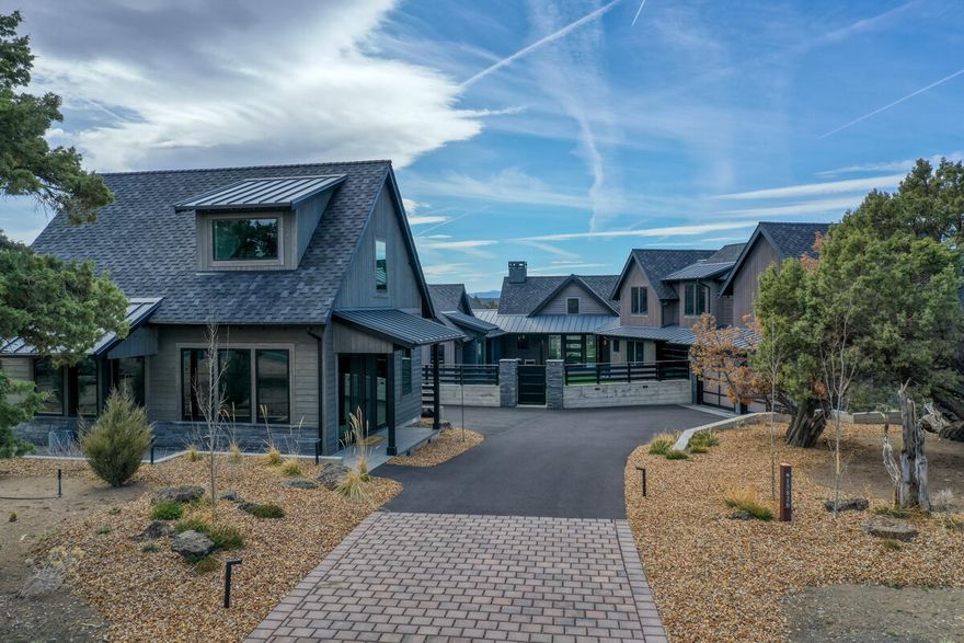 STUNNING ONE OF A KIND Custom Luxury Mountain Resort Home. ENERGY STAR smart home offered furnished/turn key/w/casita. Perfect as a primary home, successful STR and/or multi-generational living.Style & comfort with no detail missed in this amazing home. Designed to impress from the moment you walk in with custom crafted hand forged chandeliers accenting the architectural starburst ceiling, floor to ceiling gas FP. Desirable open floor plan that is a entertainers delight!State of the Art chefs kitchen offering a incredible waterfall granite island,commercial grade appliances & wet bar alcove w/extra DW & icemaker for those fun affairs. All spacious bdrm suites w/amazing bonus bunk/TV rm up. Outdoor fully fenced AstroTurf courtyard,gas firepit,water feature & heated/screened sunroom offer the ultimate in outdoor entertaining!Sitting high above the 10th fairway,enjoy the golfers without sacrificing privacy. Separate private Casita too! (STR client list & initl Mgmt Assist w/right Offer!