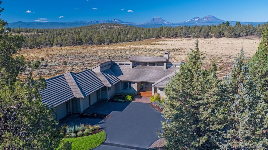 Single level Van Sant designed home on 40 acres in one of the most private and serene settings in Central Oregon.  The quiet has to be experienced to be believed.  Superb mountain views from Broken Top to Mount Jefferson.  The property is frequented by a broad spectrum of wildlife including elk, mule deer, coyotes, owls, hawks, and much more.  The home features 3 bedrooms, 3 bathrooms, an office or 4th bedroom (with bathroom), and a vaulted ceiling great room.  The 4 car garage includes one bay that will accommodate a small RV.  The kitchen, great room and primary suite offer stunning views, even from the shower!