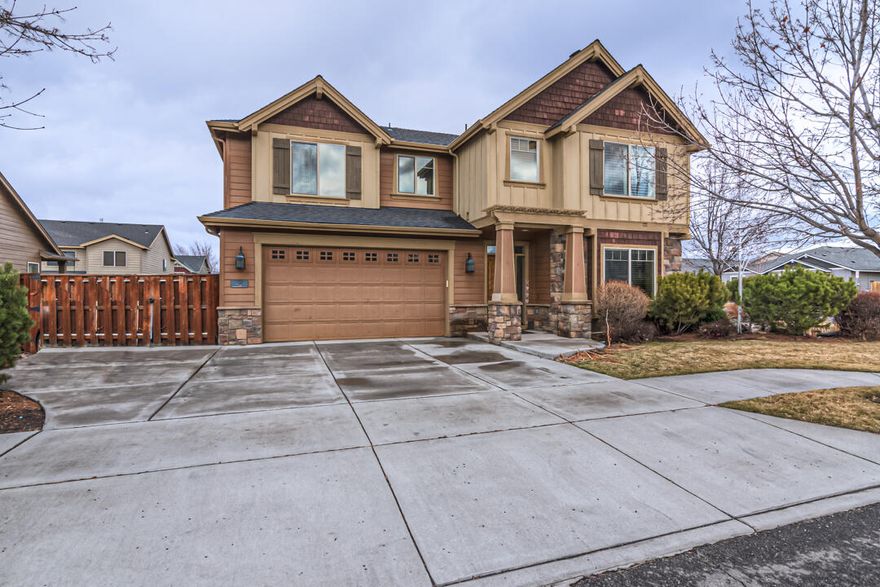 Fantastic 4 bedroom, 3 full bath Pahlisch Model home with many upgrades.  Wood floors, custom cabinetry, and solid surface counters. Open 2 story living room with gas fireplace looks over the backyard water feature. Custom hand-rails on stairs & balcony. Water feature at top of stairs. RV parking & 3 car tandem garage with custom epoxy floors & storage. HOA includes pool, trails, pavilion, and front yard landscaping. Call for a showing today!