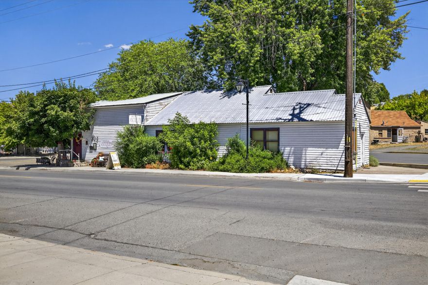 Discover the charm of a historic commercial building nestled in a prime location, perfect for a variety of business ventures. This property seamlessly combines the allure of the past with the functionality required for modern enterprises. Currently operating as a thriving antique store, empty lot is being used as a food truck court (lot size 0.13) it offers a unique opportunity for entrepreneurs looking to invest in a property with rich history and vibrant potential. Both Tax lots sold together.