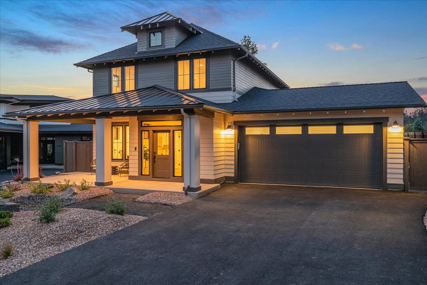 SPECIAL LOW INTEREST RATE FINANCING AVAILABLE THROUGH BUILDER'S PREFERRED LENDER STARTING AS LOW AS 4%!  This American Foursquare blends timeless architectural character with modern functionality.  The main level features an open-concept living area anchored by a chef's kitchen, floor-to-ceiling custom cabinetry, an office/den, and premium engineered hardwoods. Casement windows bring in abundant natural light, while a private patio off the main-level primary suite offers a quiet retreat—perfect for morning coffee or evening wind-downs.  Upstairs, two additional bedrooms and an oversized flex space provide room to grow, play, or create—ideal for a media room, home gym, or studio. Throughout the home, MCD's signature craftsmanship and elevated finishes deliver a sense of quality and comfort that stands out.  All just moments from Shevlin Park's extensive trail system, parks, and the vibrant amenities of Northwest Crossing.