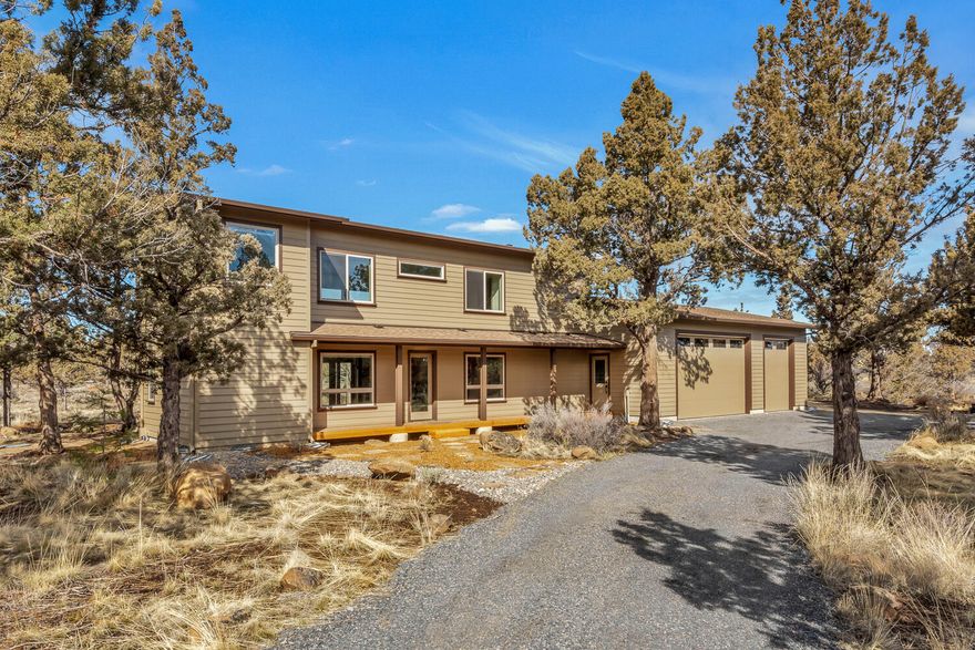 Secluded property conveniently located in desirable Tumalo is your perfect haven from the hectic life. Sited on 5+ acres of native landscape with Cascade Mtn views, custom-built home offers an open floorplan with many windows to enjoy magnificent views & privacy. Great room includes chef's kitchen with granite counters & island, living area kept cozy with wood stove. Over-sized garage leads to mudroom with full bath, laundry, built-in cabinets & heated floors. Upstairs owner's suite encompasses entire second floor. Pamper your feet on wool carpet & heated floors in bath and shower. Gorgeous soaking tub, dual vanities, ample cabinets & private water closet complete the spa experience. Walk-in closet features a laundry chute. Finishes include fir ceilings, pine walls, tan oak hardwood floors. RV parking & hookup, 60-amp generator outlet, 680' deep well, wired for hot tub. County permits issued in 2018; home completed in 2022. DO NOT DRIVE ON PRIVATE ROAD WITHOUT APPOINTMENT.