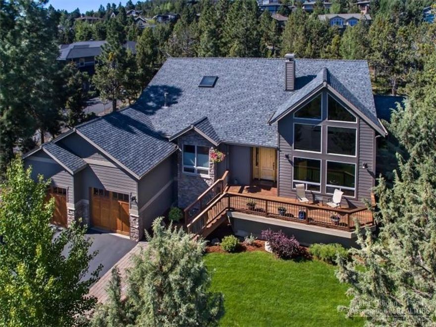 Enjoy wonderful views & elbow room. Warm & inviting, this 3 bedroom home offers a main level master suite with a huge walk-in closet, office & living areas all on the first floor. On the upper level are two bedrooms with a Jack & Jill bath, a bonus room and a loft area. Front & rear decks offer ample outdoor space on which to entertain during the warmer months, the .64 acre lot provides privacy & the 3 car garage room for storing all of you toys.