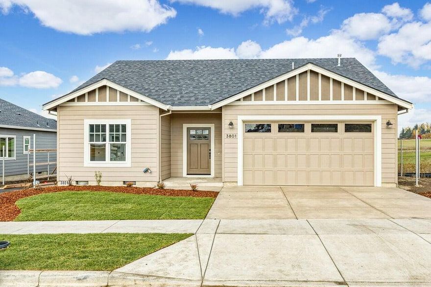 Built in 2024 in a beautiful country setting in Medford area with views of surrounding mountains nearby! An exceptional quality builder that we've grown to love in the valley throughout the years is what you get when you purchase a home built by Pac Trend Homes. A Stunning craftsman styled home with approximately 1665 sq ft, 3 bedrooms, 2 full baths. Features an open kitchen with beautiful granite counters including high end light fixtures and a gorgeous fireplace. Custom cabinets are birch and alder with the highest quality in the industry. Luxury vinyl plank flooring in the entry , kitchen, living room and hallways. Bathrooms and laundry include tile flooring. Professional landscaping in front and back round out this house. Estimated completion date November 2024. Other lot and home packages are available. Listing agent is related to seller. Pictures are for illustration purposes only.