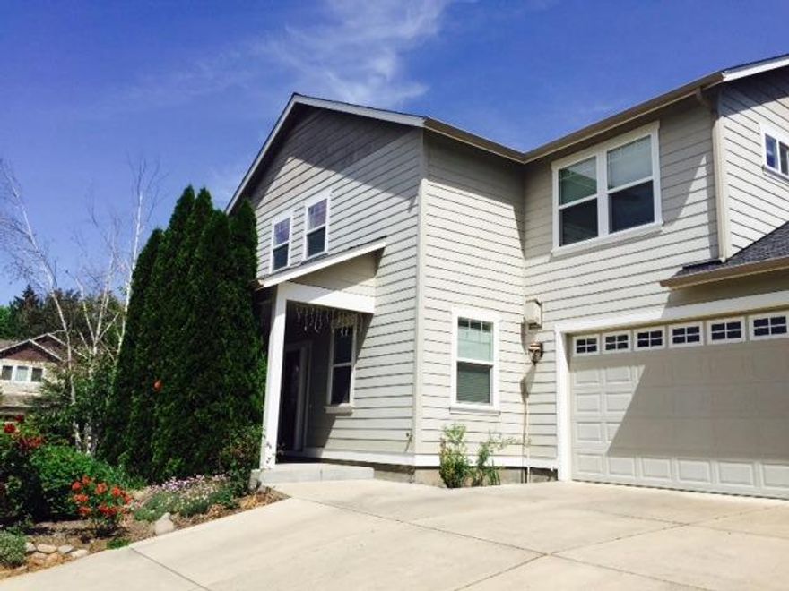 Spacious 2055 square feet home built in 2004 by Eric Green in Lithia View subdivision on a corner lot. 3 bedrooms upstairs plus office on main level could be a fourth bedroom. Master bedroom has vaulted ceilings, ceiling fan and large walk-in closet. Master bath has large soaking tub, step-in shower and double vanity with ceramic tile countertop. Kitchen has granite counters, cherry cabinets, oak floors, dog door, ceiling fan and a large walk in pantry. Dining area opens to living room with gas fireplace with blower. Gas forced air heat and AC with zones on each level. Wired for internet and speakers. Exterior is fully fenced with mature landscaping, sprinkler system and patio. New in 2015: Gas hot water heater, Whirlpool refrigerator, GE gas range, paint on exterior trim, and all substructure HVAC. Two car attached garage. No HOA dues.
