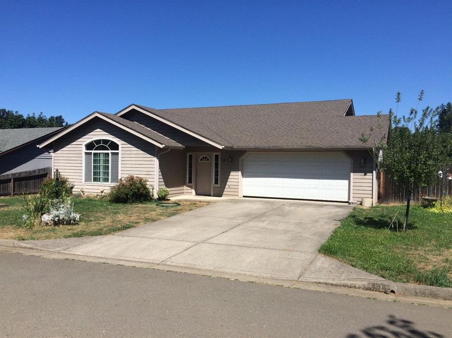 Built in 2002, this light and bright home with open floor plan and vaulted ceilings is ready for new owners. Tiled entry and high ceilings lead to the spacious living room and open kitchen with walkout to the covered patio and fenced backyard. The 1570 sq/ft include 3 bedrooms and 2 bathrooms; the large master features a walk-in closet and private bathroom. Well cared for and immaculately clean, this home sits in a quiet neighborhood across from undeveloped green pasture...if you're looking for an affordable Glendale home, this one is a must see!