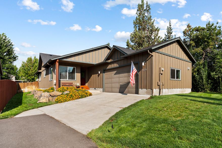 This beautiful home boasts warm finishes and an inviting floor plan. The breakfast nook is bright, the kitchen opens to the vaulted living room, and the bedrooms are large. Some of the custom features include granite tile counters, tile and carpet flooring and stainless steel appliances. The backyard is fully fenced and near the front of the home is a greenhouse. This property is fully landscaped and located in Southwest Redmond, just a short distance from Umatilla Sports Complex and numerous shopping opportunities.