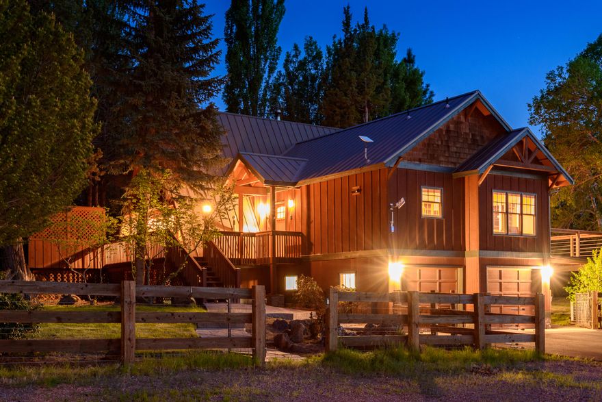 Highly sought after location between up & coming Tumalo & Sisters, just minutes from Bend. This property features a charming 3,449 sf Chalet-style home with 3 bedrooms, 3 baths & a den, perfect for those who love Central Oregon's rustic charm. The home boasts a large A-frame living room with a modern/large wood-burning stove & picturesque views of the pond & mountain views from the open loft. The home was fully updated in 1999 with hardwood floors throughout, granite countertops, cherry cabinets & a spacious primary suite with vaulted ceilings & a large soaking tub. Recent upgrades include a paved driveway, high-end Kentucky black 3 rail fence, 7 acres of inground irrigation & a large 2nd story deck looking out to the pond. This private & quiet property, located on the edge of BLM, offers park-like pasture & is ideal for anyone who loves the outdoors, with miles of BLM horse & hiking trails adjacent to the property. The property includes a 4-stall barn, large shop & custom greenhouse.