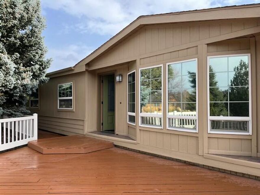 Welcome home to one of Bends finest 55+ park. You won't want to miss out on this updated, spacious home. 2bd/2ba 1512sqf. with a huge wrap a round deck and a peek a boo view of the Cascade Mtn. All new pex plumbing with a new hot water heater. Stainless range/oven and dishwasher. Corner lot across from community clubhouse which offers a beautiful pool, workout facility and library. 2 car garage with lots of cabinets and shelving plus an additional attached room great for hobby/craft room. Cascade Village is located close to lots of shopping 
(new Costco & Trader Joes!). Fidelity National Home Warranty included for one year at close of escrow!