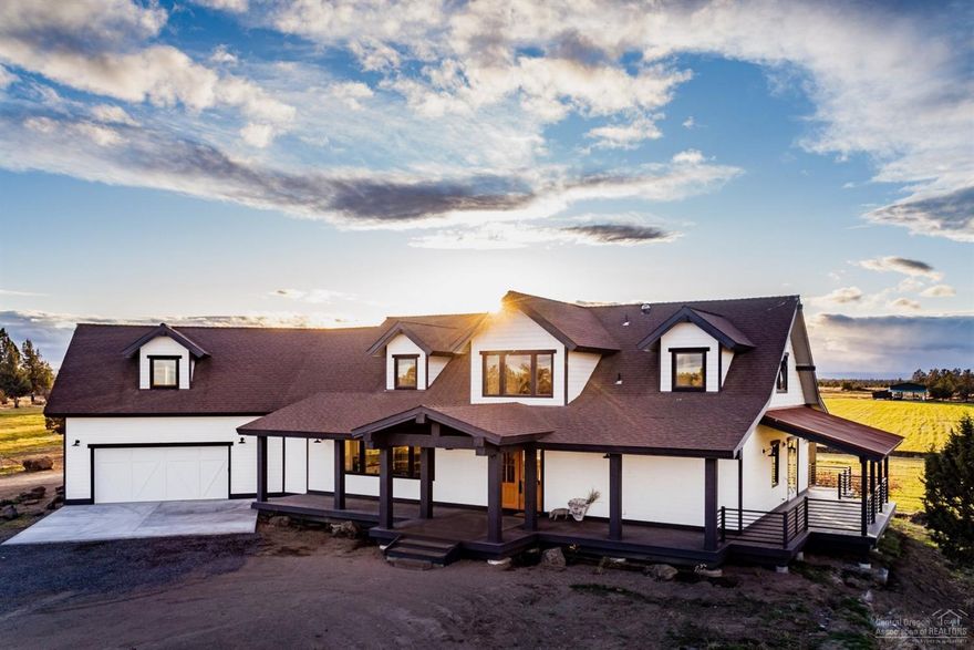 Not often does a property with this level of detail find its way to the open market. More than a decade of work to visualize, plan and then create this exquisite designer home that is truly harmonious with its surrounding. Positioned in a way to offer unparalleled views from every room, this striking home overlooks fields of green with a Cascade Mountain backdrop to the West and capturing endless and expansive views from each room. A sprawling 162 acre ranch with 80 acres of valuable and deeded irrigation rights.This newly constructed modern farmhouse offers over 3800 sq. feet of designer living. A separate farm hand house (currently occupied with the employed ranch hand). A large hay barn. Several loafing sheds located on existing fenced pastures. A gorgeous pool-like pond. Brand new Valley Center Pivot Line. Irrigation equipment to completely irrigate 80 acres (including two 20 HP irrigation pumps).<br>