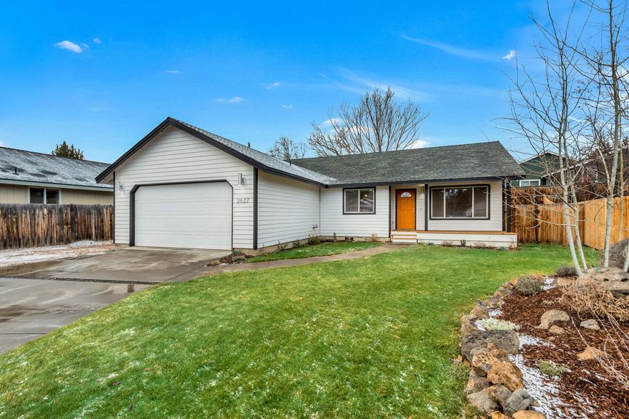 This well cared for single level home on a quiet cul de sac has been tastefully remodeled with a modern touch and is centrally located in close proximity to all the amenities NE Bend has to offer: jobs, schools, parks, shopping (Costco and Whole Foods) and breweries. The home features newly installed custom maple hardwood floors throughout the living area, a new oversize front porch for enjoying the morning sun and an enormous new back deck perfect for entertaining & indoor/outdoor living. The open floor plan is centered around the vaulted great room and open kitchen with quartz countertops, new stainless appliances and modern light fixtures. Two bedrooms on the south side of the house are tucked away for privacy and receive abundant natural light. Bonus room off kitchen can be used as an office, gym, guest room or nursery. Backyard is fully fenced and accessible with a dog door. Gravel parking area next to driveway is perfect for storing RV, snowmobile or other Central Oregon toys!